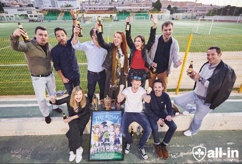 all-in translations team celebrating in football pitch in malta
