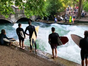 Eisbach Wave Munich. The Eisbach is located on the southern edge of the English Garden and is considered a perfect photo spot for photographers, surfers and of course, spectators. Visit it during EURO 2024.